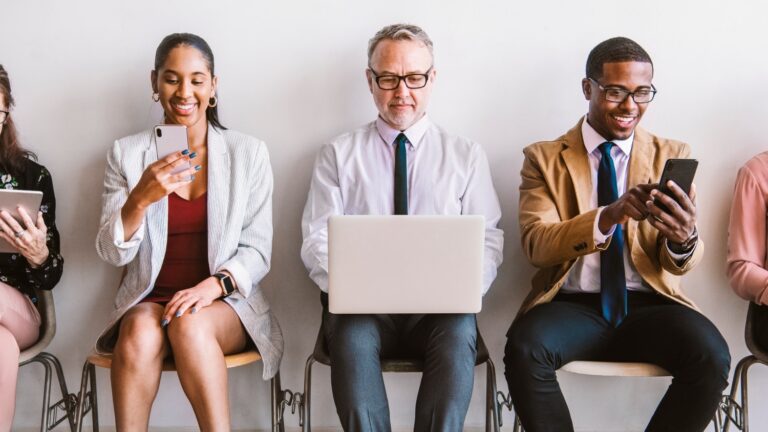 Business team with different devices