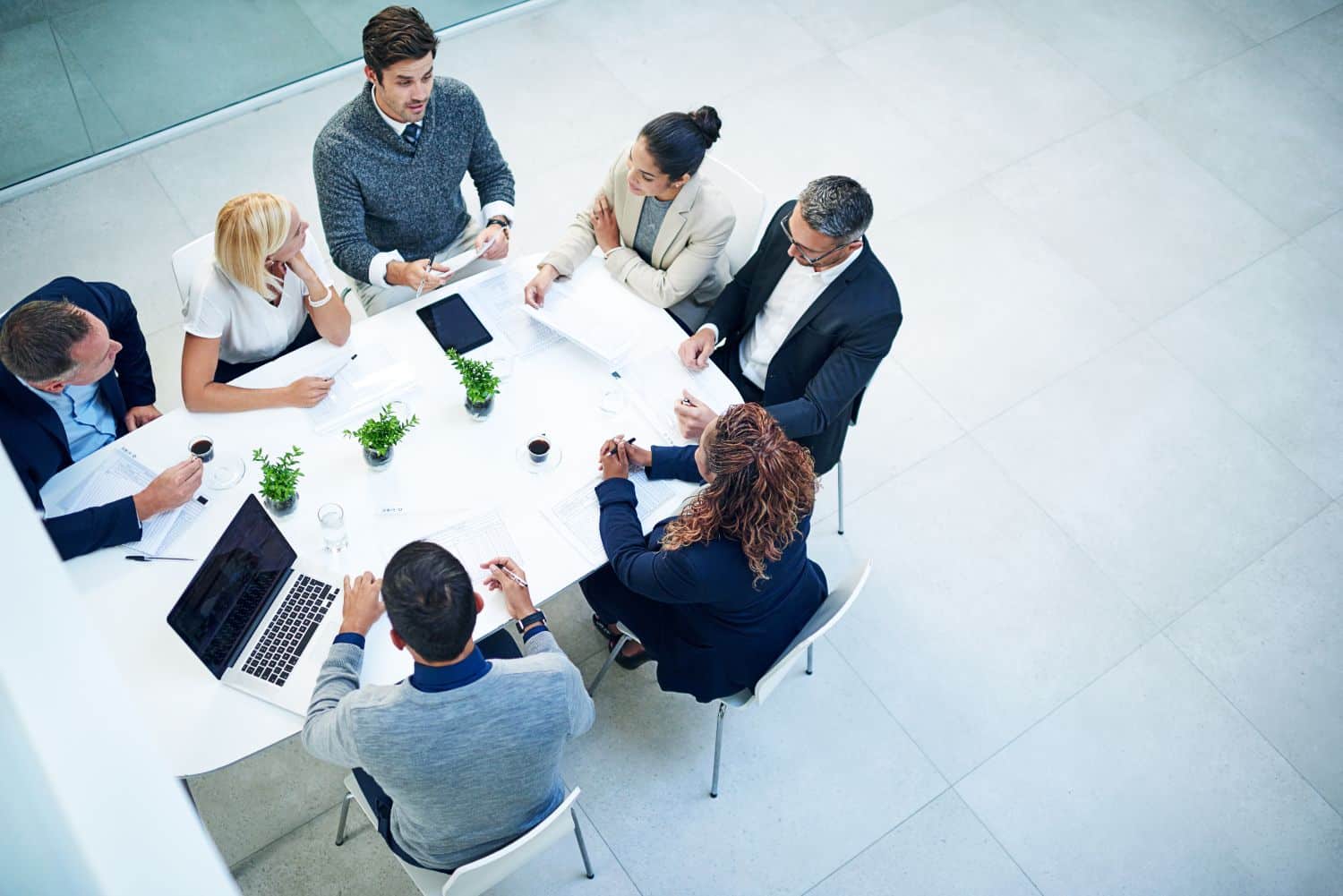 Shot of corporate colleagues working together in their office